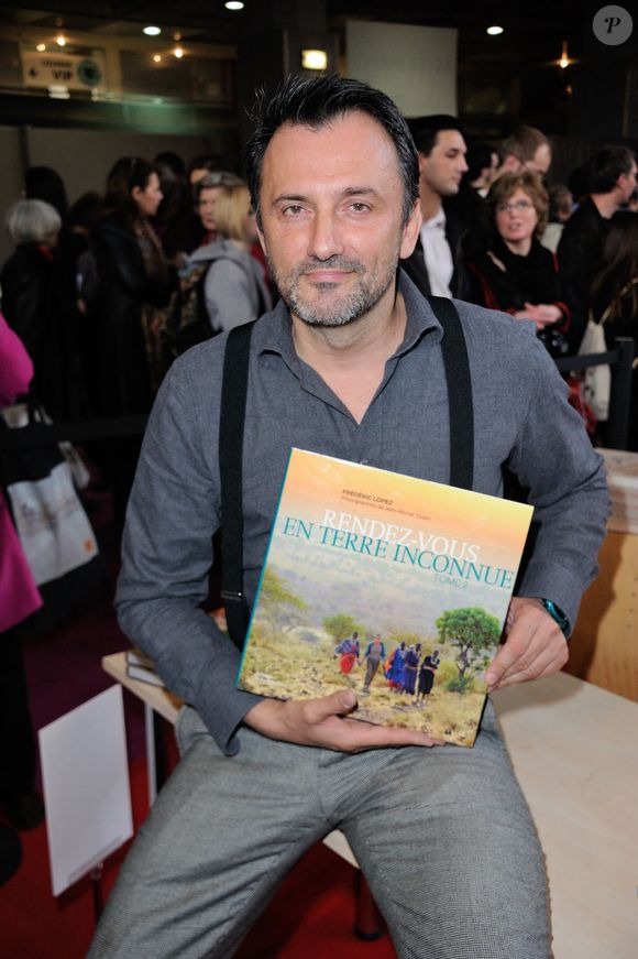 Frederic Lopez signe des exemplaires de son livre lors du 34e Salon du Livre de Paris qui s'est tenu au Parc des Expositions, Porte de Versailles à Paris, France le 22 mars 2014. Photo par Alban Wyters/ABACAPRESS.COM