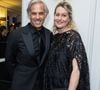 Exclusif - Paul Belmondo et sa Luana (habillée par Marina Rinaldi, chaussures Roger Vivier) - Dîner de l'association AEM (Un Avenir pour les Enfants du Monde), au profit des enfants du Rwanda par Babeth Djian au pavillon Ledoyen à Paris. Le 23 mars 2023
© Olivier Borde-Bertrand Rindoff Petroff / Bestimage