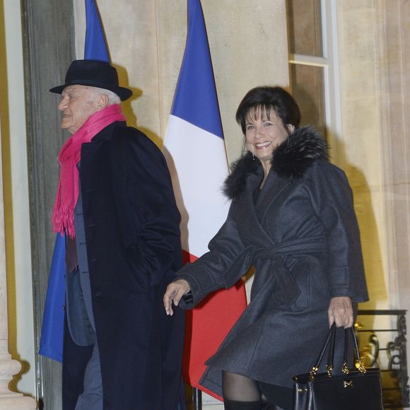 Pierre Nora et Anne Sinclair arrivent au Palais de l'Elysée a Paris le 9 decembre 2013. L'historien Pierre Nora a été décoré Grand officier de la Légion d'honneur par le président François Hollande. AGENCE / BESTIMAGE