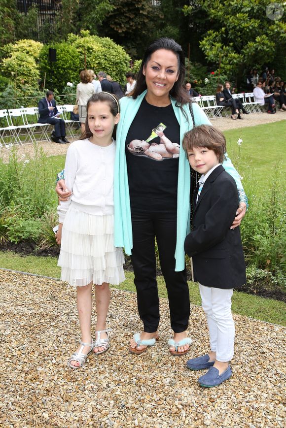 Hermine de Clermont-Tonnerre et ses enfants Allegra et Calixte - People au defile de mode Haute-Couture Automne-Hiver 2013/2014 "Franck Sorbier" a l'ambassade de Suisse a Paris. Le 3 juillet 2013 @PIX4U / BESTIMAGE