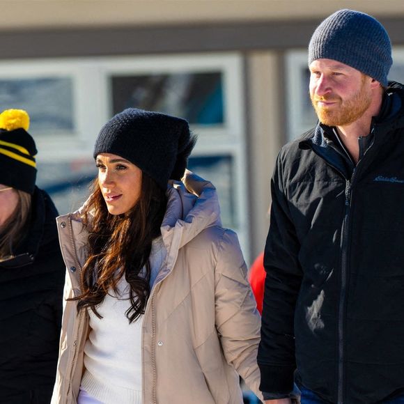 Le prince Harry, duc de Sussex et Meghan Markle, duchesse de Sussex, en visite au camp d'entrainement des athlètes des Invictus Games 2024 à Whistler en Colombie Britannique, le 14 février 2024. (Backgrid USA / Bestimage).
