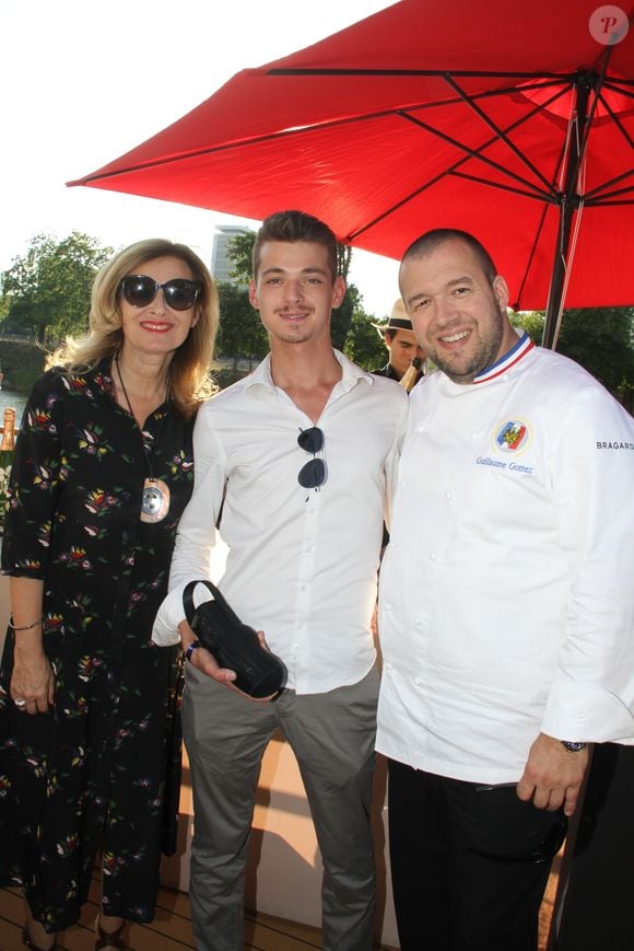 Valerie Trierweiler, son fils Léonard et Guillaume Gomez (chef des cuisines du palais de l'Elysée) - 6ème édition du Trophée de la Pétanque Gastronomique au Paris Yacht Marina à Paris, France, le 28 juin 2018. © Philippe Baldini/Bestimage