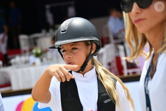 Laurie Lagrange, Giulia Sarkozy lors de la coupe Kids Cup L'Envol lors du Longines Paris Eiffel Jumping le 20 juin 2025

© Perusseau / Veeren / Bestimage
