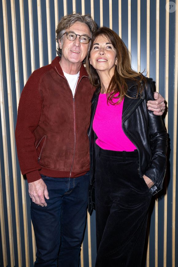 François Cluzet et sa femme Narjiss Slaoui-Falcoz à l'avant Première Parisienne du film "Seule la terre est éternelle" à l'UGC Danton, le 22 mars 2022. © Olivier Borde / Bestimage