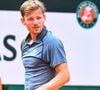 Il apparait aussi avec un autre grand nom du circuit : le Belge David Goffin. 

David Goffin  - Entraînement lors des internationaux de France de Tennis de Roland Garros 2026 (18 mai - 7 juin 2026), le 20 mai 2026. 
© Baptiste Autissier / PsnewZ / Bestimage