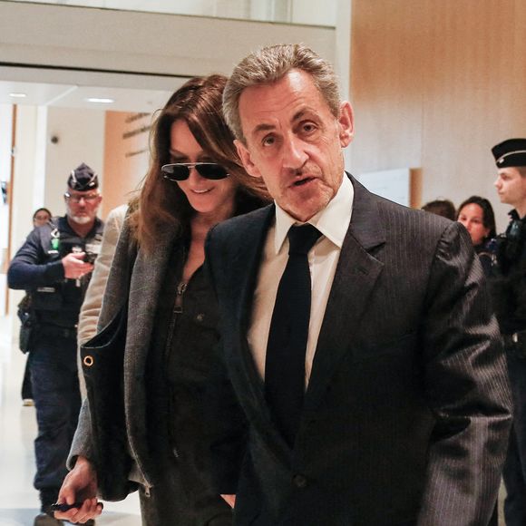Nicolas Sarkozy et sa femme Carla Bruni - Dernier jour du procès du financement libyen de Sarkozy: ses avocats de l’ancien président vont plaider la relaxe, au tribunal de Paris, France, le 8 avril 2025. © Christophe Clovis/Bestimage