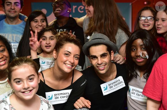Priscilla Betti et Christophe Licata participent à l'opération "Danse à l'hôpital" avec les jeunes de la Fondation Santé des Etudiants de France, pour l'association "Premiers de Cordée" à la clinique médicale et pédagogique Edouard Rist à Paris, le 17 décembre 2015. © Giancarlo Gorassini/Bestimage