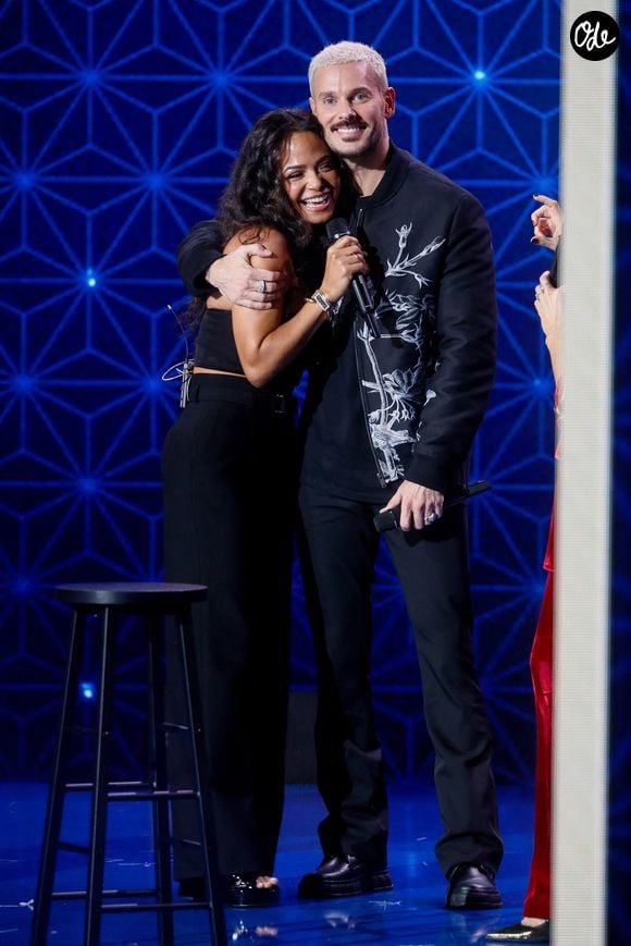 "Je faisais la fête à fond en Europe avec mes meilleures amies", écrit-elle, évoquant les restaurants, les bars, les bouteilles de champagne et les soirées à danser sur les tables.

Exclusif - M. Pokora (Matt Pokora) et sa femme Christina Milian - Surprises - Enregistrement de l'émission "La boîte à secrets N°17", présentée par F.Bollaert et diffusée le 19 janvier 2024 sur France 3
© Christophe Clovis / Bestimage