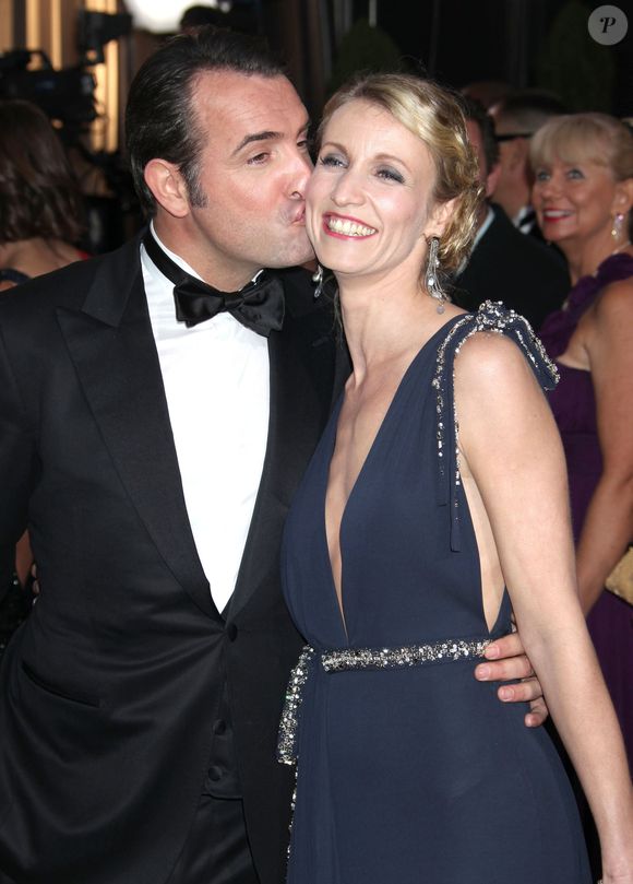 Le coup de foudre entre les deux protagonistes du show a été immédiat. / Alexandra Lamy et Jean Dujardin lors de la 84e cérémonie des Oscars / FAMEFLYNET / BESTIMAGE