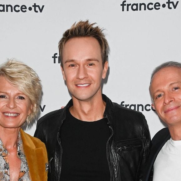 Sophie Davant, Cyril Féraud et Samuel Étienne - Conférence de presse du Telethon 2022 à Paris le 21 octobre 2022.

© Coadic Guirec / Bestimage