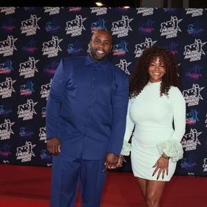 Teddy Riner et sa compagne Luthna Plocus au photocall de la 27ème édition des NRJ Music Awards au palais des Festivals de Cannes, France, le 31 octobre 2025. © Dominique Jacovides/Bestimage