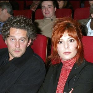 Laurent Boutonnat et Mylène Farmer à la première des Choristes au Gaumont Marignan à Paris en 2004 ©COADIC GUIREC / BESTIMAGE