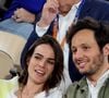 Au milieu de la sciure et de l'effort, l'artiste a également glissé une parenthèse de tendresse : un adorable message vocal de son fils Edgar, fruit de son union avec Catherine Robert.

Le chanteur Vianney et sa femme Catherine Robert en tribunes lors des Internationaux de France de Tennis de Roland Garros 2025, à Paris, France, le 6 juin 2025. © Jacovides-Moreau/Bestimage
