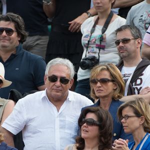 Dominique Strauss-Kahn et sa compagne Myriam L'Aouffir assistent à la finale féminine Serena Williams vs Maria Sharapova lors des Internationaux de France de Tennis 2013 au stade Roland-Garros à Paris, France le 8 juin 2013. Williams a gagné 6-4, 6-4. Photo Christophe Guibbaud/ABACAPRESS.COM