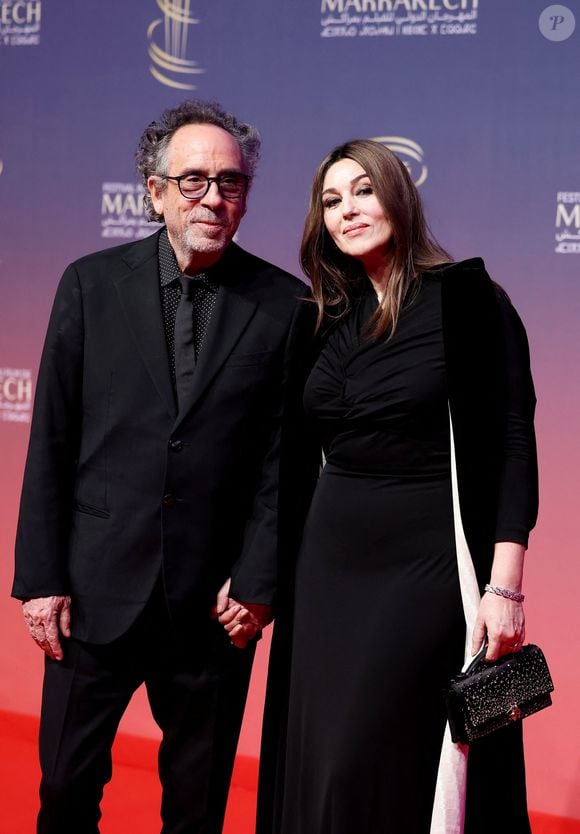 Tim Burton et Monica Bellucci au photocall de la cérémonie d'ouverture et à la projection du film "L'Ordre" lors du 21ème Festival international du film de Marrakech, le 29 novembre 2024j à Marrakech, Maroc. © Dominique Jacovides/Bestimage