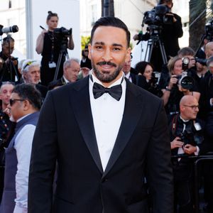 Adil Rami - Montée des marches du film " La vénus électrique " pour la cérémonie d'ouverture du 79ème Festival International du Film de Cannes, le 12 mai 2026. © Jacovides-Moreau /Bestimage