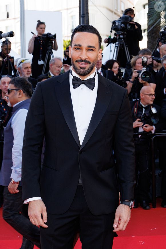 Adil Rami - Montée des marches du film " La vénus électrique " pour la cérémonie d'ouverture du 79ème Festival International du Film de Cannes, le 12 mai 2026. © Jacovides-Moreau /Bestimage