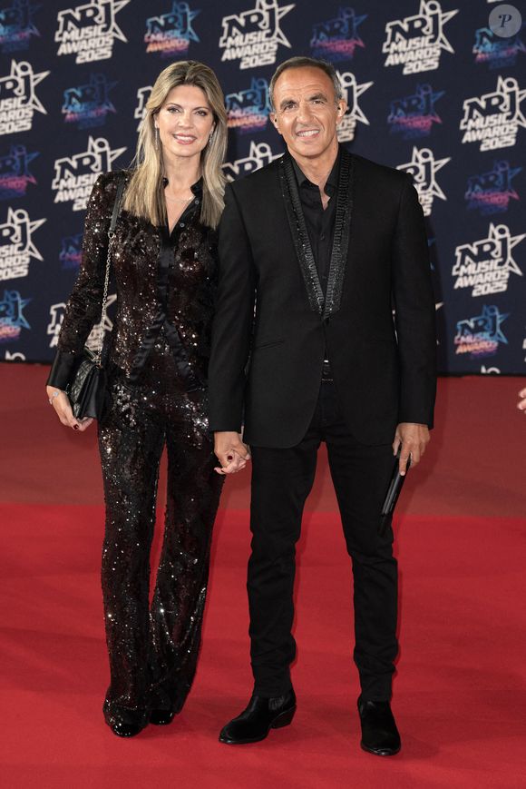 Nikos Aliagas et sa femme Tina Grigoriou assistent à la 27ème édition des NRJ Music Awards le 31 octobre 2025 à Cannes, France. Photo by David NIVIERE/ABACAPRESS.COM