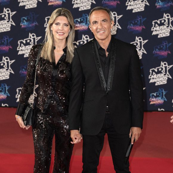 Nikos Aliagas et sa femme Tina Grigoriou assistent à la 27ème édition des NRJ Music Awards le 31 octobre 2025 à Cannes, France. Photo by David NIVIERE/ABACAPRESS.COM