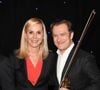 Depuis 2008, Laurence Ferrari partage la vie du célèbre violoniste Renaud Capuçon. 

Laurence Ferrari et Renaud Capuçon à l'inauguration de la statue de cire de "Renaud Capuçon" au musée Grévin à Paris, le 9 mars 2020. 

Photo : Coadic Guirec / Bestimage