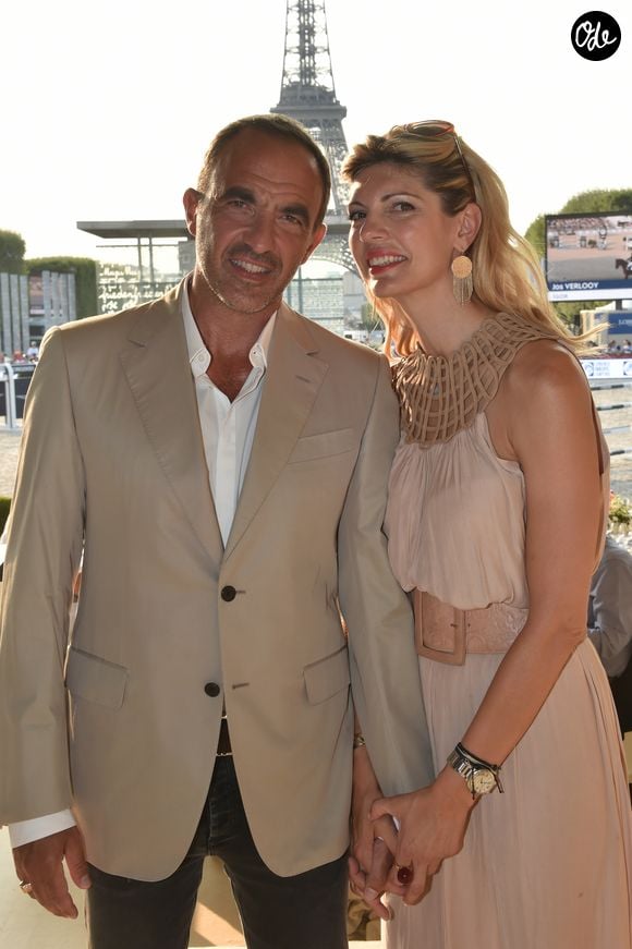 Exclusif - Nikos Aliagas et sa compagne Tina Grigoriou - People lors du Longines Paris Eiffel Jumping au Champ de Mars à Paris le 7 juillet 2018. © Perusseau/Veeren/Bestimage