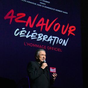 Exclusif - Michel Drucker - Spectacle symphonique "Aznavour Célébration - l'hommage officiel" en clôture du centenaire de la naissance de C. Aznavour au palais des Congrès à Paris le 23 novembre 2024. "Aznavour Célébration - Le Spectacle Symphonique," présenté par Michel Drucker, un événement exceptionnel, sous la direction artistique de Mischa Aznavour, qui rend hommage à l'une des plus grandes voix de la chanson française, Charles Aznavour. Ce concert unique en son genre réuni des artistes de renom et un orchestre symphonique composé de 80 musiciens pour célébrer tout en musiques et en images, l'héritage incomparable de cet artiste légendaire. Cet événement, voulu par la famille Aznavour comme l’hommage officiel dans le cadre des célébrations du centenaire, s'est tenu le samedi 23 novembre 2024 au Palais des Congrès de Paris. Un lieu emblématique qui a souvent accueilli Aznavour tout au long de sa carrière et qui fut sa salle « fétiche ». Ce show proposera des interprétations magistrales des plus grands succès de Charles Aznavour, réarrangés en symphonique sous la direction du chef d'orchestre Vahan Mardirossian, pour accompagner la voix du « Grand Charles ». Les spectateurs auront le privilège d'entendre des titres emblématiques tels que "La Bohème," "Emmenez-moi," et "Hier encore" et tant d’autres dans des versions symphoniques inédites, offrant une nouvelle dimension à ces chefs-d'œuvre. Des artistes invités, comme notamment Alain Chamfort, Thomas Dutronc, Antoine Delie, Noha. R et bien d’autres, se joindront à l'orchestre pour interpréter ces chansons qui ont marqué des générations. Deux heures de spectacle avec une entracte de 15mn. "Aznavour Célébration" proposé par Thierry Chabrot, n'est pas seulement un concert, mais aussi un ciné-concert pour mettre en avant un autre de ses talents, celui d’acteur. Une véritable immersion dans l'univers d'un artiste dont les paroles, la musique et rôles au cinéma continuent de toucher les cœurs à travers le monde. Cet événement est également une opportunité de rappeler l'impact culturel et émotionnel de Charles Aznavour, et de célébrer la longévité de son œuvre. © Lydia Kasparian/ Bestimage 
No Web - Belgique et Suisse