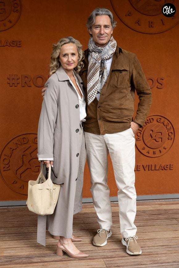Laurent Solly et sa femme Caroline Roux au photocall du village lors des Internationaux de France de Tennis de Roland Garros 2026, à Paris, France, le 5 juin 2026. © Jacovides-Moreau/Bestimage