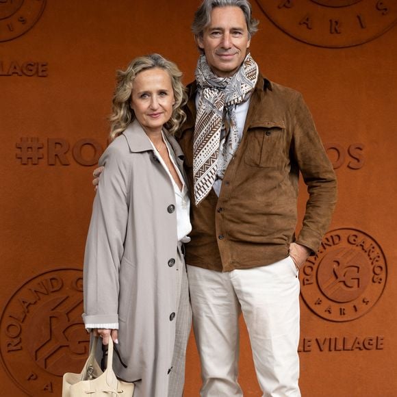 Laurent Solly et sa femme Caroline Roux au photocall du village lors des Internationaux de France de Tennis de Roland Garros 2026, à Paris, France, le 5 juin 2026. © Jacovides-Moreau/Bestimage