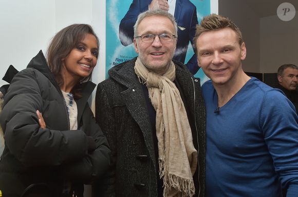 Karine Le Marchand, Laurent Ruquier et JeanFi Janssens au cocktail après la générale du spectacle "JeanFi (Janssens) Décolle" à l'Alhambra à Paris, le 7 décembre 2017.
© Giancarlo Gorassini/Bestimage