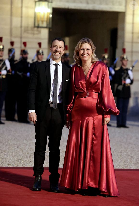 Yaël Braun-Pivet, Présidente de l'Assemblée Nationale et son mari  Vianney Pivet arrivant au dîner d'état au palais de l'Elysée à Paris en l'honneur de la visite du roi et de la reine de Belgique en France le 14 octobre 2024.

© Dominique Jacovides / Bestimage