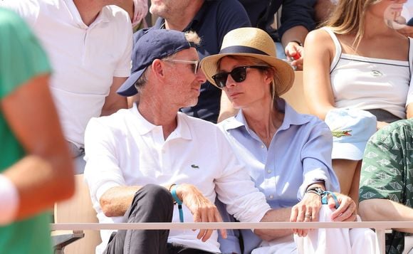 Puis, elle a lancé, avec une amie à elle, "Les Maturins", de la tapisserie et de la plumasserie. Denis Brogniart et sa femme Hortense - Célébrités dans les tribunes des Internationaux de France de tennis de Roland Garros 2023 le 6 juin 2023. © Jacovides-Moreau/Bestimage