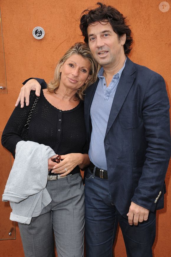Bruno Madinier et sa femme assistent aux Internationaux de France de tennis 2012 dans l'arène de Roland Garros à Paris, France, le 3 juin 2012. Photo by Gorassini-Guibbaud/ABACAPRESS.COM