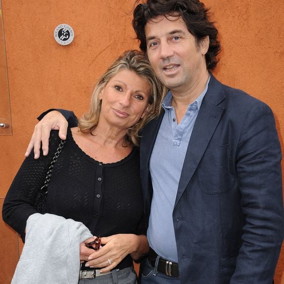 Bruno Madinier et sa femme assistent aux Internationaux de France de tennis 2012 dans l'arène de Roland Garros à Paris, France, le 3 juin 2012. Photo by Gorassini-Guibbaud/ABACAPRESS.COM