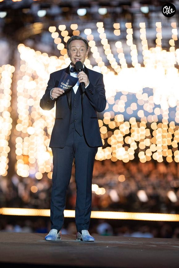 Passionné de patrimoine, l'animateur suit ce projet depuis 2014.

Stéphane Bern lors du concert de Paris avec l'Orchestre national de France pour France 2 en partenariat avec Radio France au pied de la Tour Eiffel le 13 juillet 2026.

© Perusseau / Veeren / Bestimage