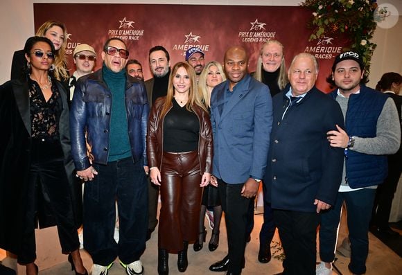 JoeyStarr et sa compagne Pauline Latchoumanin, Michael Cohen,Pierre M'Bappé, Emmanuel Petit, Norman Thavaud et sa femme Martha, - 104ème édition du Prix d'Amérique 2025 à l'hippodrome Paris-Vincennes le 26 janvier 2025. © Christian Liewig/Bestimage