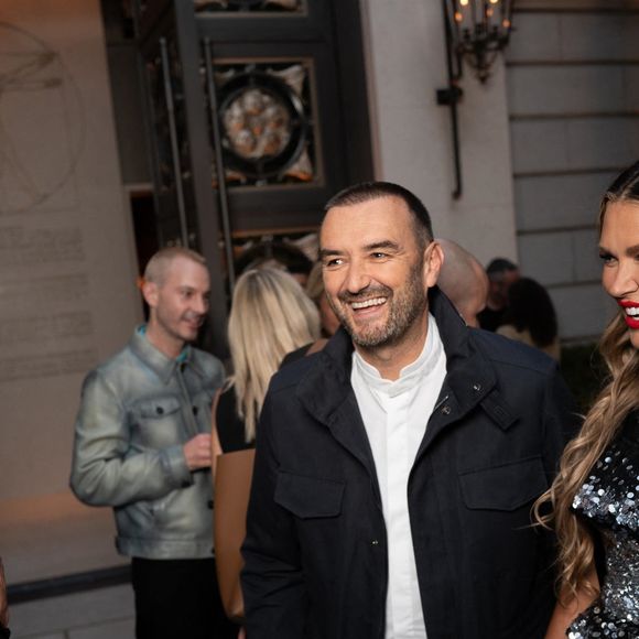 Cyril Lignac, Bella Hunter - Personnalités à la soirée d'inauguration de la galerie RH Paris sur l'avenue des Champs-Élysées le 4 septembre 2025 Backgrid USA / Bestimage