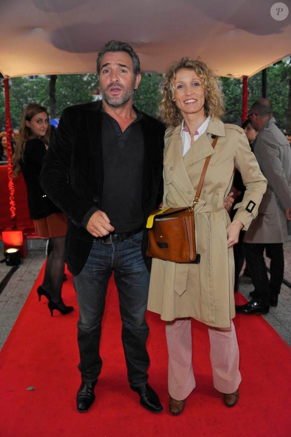 Jean Dujardin et Alexandra Lamy - Avant-première du film "Un bonheur n'arrive jamais seul" au Gaumont Marignan à paris le 15 juin 2012 ©Agence/ Bestimage