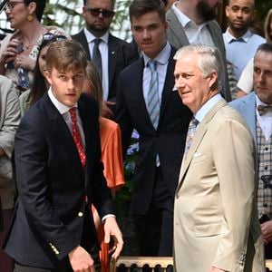 Le prince Emmanuel de Belgique et son père le roi Philippe de Belgique - Garden Party du 10ème anniversaire de règne du roi Philippe de Belgique au domaine Royal de Laeken à Bruxelles (Belgique), le 13 mai 2023. Photonews / Bestimage