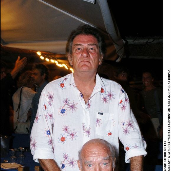 Eddy Mitchell et Eddie Barclay à la soirée Marcel Campion au golf Azur de St Tropez le 08 août 2003. Photo par RACHID BELLAK / BESTIMAGE
