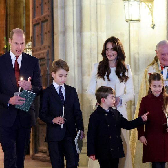 Le prince William de Galles, Kate Catherine Middleton, princesse de Galles et leurs enfants, le prince George, la princesse Charlotte et le prince Louis lors du traditionnel concert de Noël "Together At Christmas" en l'abbaye de Westminster à Londres. Photo par PA Photo/ Bestimage