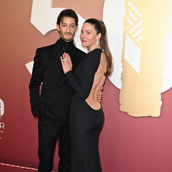 Pierre Niney et Natasha Andrews arrivent à la 50e cérémonie des César du cinéma à L'Olympia le 28 février 2025 à Paris, France. Photo by David Niviere/ABACAPRESS.COM