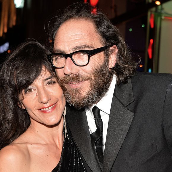 Romane Bohringer et son ex-compagnon Philippe Rebbot - Personnalités lors de la 10ème cérémonie des Globes de Cristal au Lido à Paris, le 13 avril 2015. © VEEREN / BESTIMAGE)