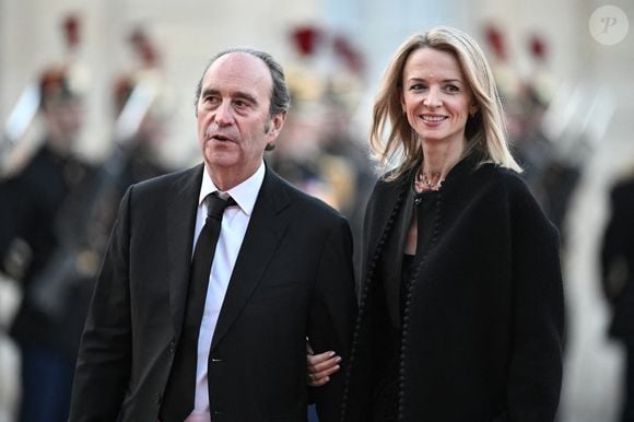 Le PDG du groupe Iliad et Free Xavier Niel et la PDG de Dior Delphine Arnault arrivent au palais présidentiel de l'Elysée pour assister à un dîner d'État en l'honneur du couple royal du Danemark, à Paris, France, le 31 mars 2025, lors de leur visite d'État. Photo by Eliot Blondet/ABACAPRESS.COM