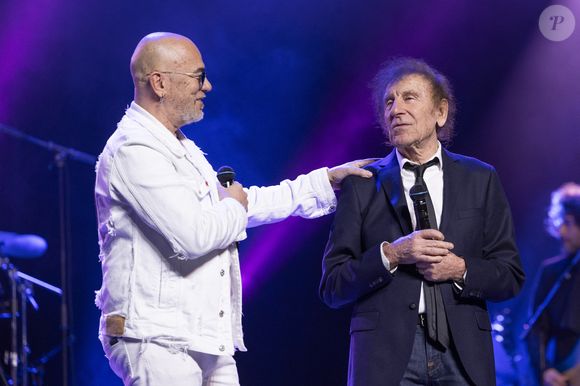 Pascal Obispo, Alain Souchon au concert du gala des 20 ans de la fondation Recherche Alzheimer "2 générations chantent pour la 3ème" à l'Olympia à Paris le 18 mars 2024.

© Cyril Moreau / Bestimage