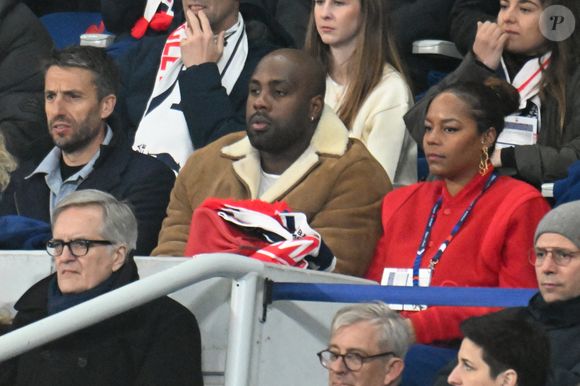 Tony Estanguet, Teddy Riner et sa femme Luthna Plocus au match de rugby du Tournoi des Six Nations France contre Angleterre au Stade de France à Saint-Denis le 14 mars 2026

© Lionel Urman / Bestimage