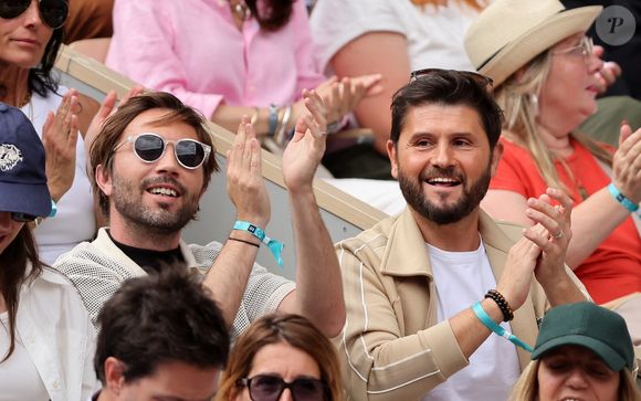 Christophe Beaugrand et son mari Ghislain Beaugrand-Gerin dans les tribunes lors des Internationaux de France de Tennis de Roland Garros 2025. Paris,

© Jacovides / Moreau / Bestimage