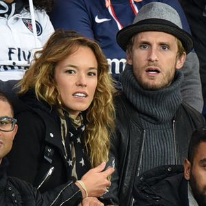 Philippe Lacheau et sa compagne Elodie Fontan lors du match de football de première division française, Paris-St-Germain vs Guingamp au Parc des Princes, Paris, France le 22 septembre 2015. Photo by Laurent Zabulon/ABACAPRESS.COM