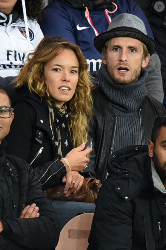 Philippe Lacheau et sa compagne Elodie Fontan lors du match de football de première division française, Paris-St-Germain vs Guingamp au Parc des Princes, Paris, France le 22 septembre 2015. Photo by Laurent Zabulon/ABACAPRESS.COM