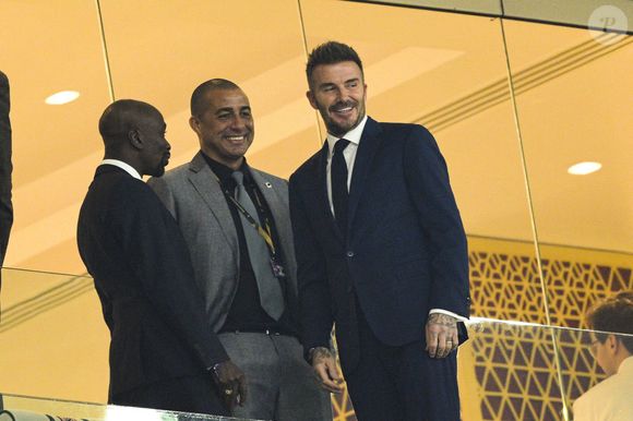 David Beckham / Claude Makelele et David Trezeguet en tribune du match de football de quart de finale opposant la France à l’Angleterre lors de la coupe du Monde (FIFA 2022) au stade Al Bayt à Al Khor au Qatar, le 10 décembre 2022. La France a gagné 2-1. © Jean-Baptiste Autissier/Panoramic/Bestimage