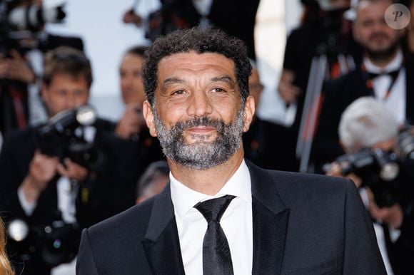 Ramzy Bedia - Montée des marches du film « The Phoenician Scheme » lors du 78ème Festival International du Film de Cannes, au Palais des Festivals à Cannes. Le 18 mai 2025 © Jacovides-Moreau / Bestimage